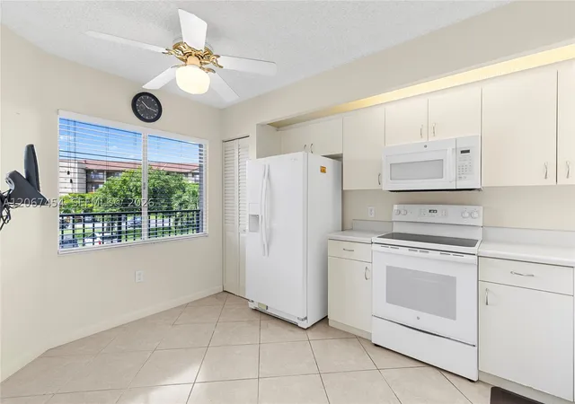 Photo 3 of Condo for sale at 13705 Sw 12th St #208B, Pembroke Pines, FL 33027 | MLS# A12067454 | Listing updated on 2026-09-11