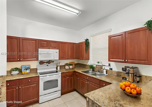 Photo 3 of Townhouse for sale at 12958 Sw 135th St, Miami, FL 33186 | MLS# A12067537 | Listing updated on 2026-09-14