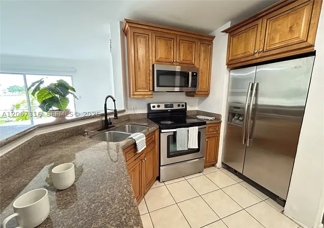 Photo 1 of Condo for sale at 3409 Nw 44th St #106, Oakland Park, FL 33309 | MLS# A12067316 | Listing updated on 2026-09-12