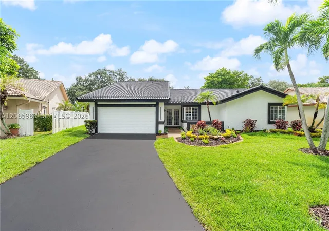 Photo 1 of Sale Pending at 695 Nw 107th Ln, Coral Springs, FL 33071 | MLS# A12065983 | Listing updated on 2026-09-02