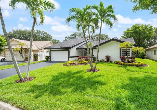 Photo 2 of Sale Pending at 695 Nw 107th Ln, Coral Springs, FL 33071 | MLS# A12065983 | Listing updated on 2026-09-02