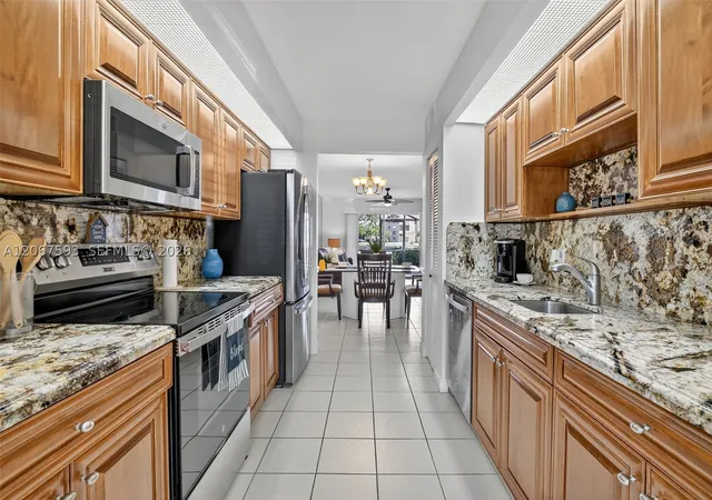 Listing Photo 4 - Condo for sale in building located at 13705 Sw 12Th St, Pembroke Pines, FL 33027 - Unit #103B
