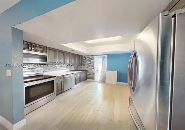Photo 3 of Multi family home for sale at 2411 Thomas St, Hollywood, FL 33020 | MLS# A12067672 | Listing updated on 2026-09-24
