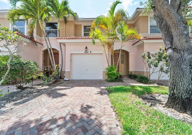 Photo 1 of Townhouse for sale at 2410 Seminole Palms Dr, Green Acres, FL 33463 | MLS# A12066925 | Listing updated on 2026-09-08