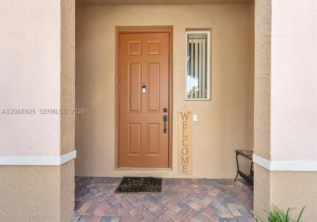 Photo 2 of Townhouse for sale at 2410 Seminole Palms Dr, Green Acres, FL 33463 | MLS# A12066925 | Listing updated on 2026-09-08