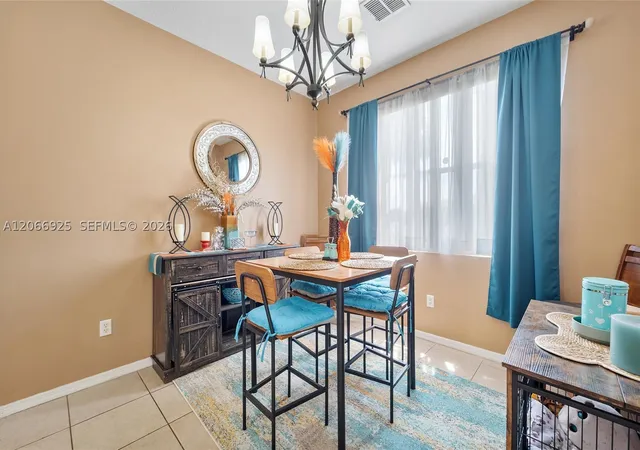 Photo 4 of Townhouse for sale at 2410 Seminole Palms Dr, Green Acres, FL 33463 | MLS# A12066925 | Listing updated on 2026-09-08