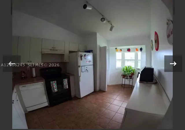 Photo 2 of Townhouse for sale at 985 Ne 34th Ave #203, Homestead, FL 33033 | MLS# A12066245 | Listing updated on 2026-09-10