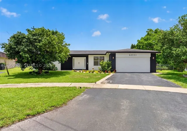 Photo 1 of Single family home for sale at 6091 Sw 14th St, Plantation, FL 33317 | MLS# A12069006 | Listing updated on 2026-09-05