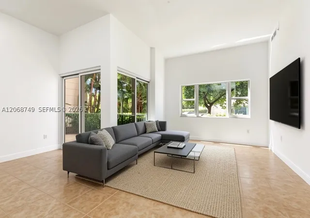 Listing Photo 1 - Condo for sale in building located at 19900 E Country Clb Dr, Miami, FL 33180 - Unit #104