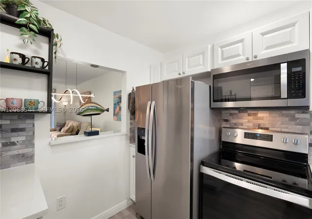 Photo 2 of Condo for sale at 6750 Royal Palm Blvd #107E, Margate, FL 33063 | MLS# A12068544 | Listing updated on 2026-09-14