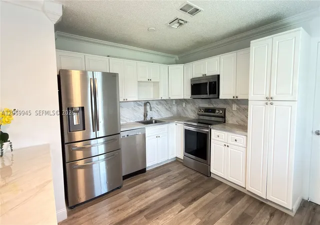 Photo 4 of Single family home for sale at 8151 Sw 7Th St, North Lauderdale, FL 33068 | MLS# A12069945 | Listing updated on 2026-09-21