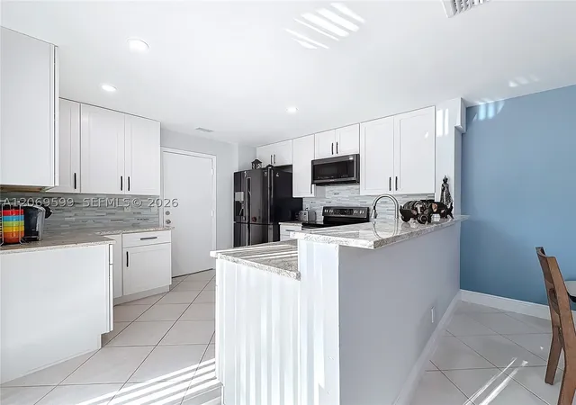 Photo 3 of Sale Pending at 10977 Long Boat Dr #10977, Cooper City, FL 33026 | MLS# A12069599 | Listing updated on 2026-09-12