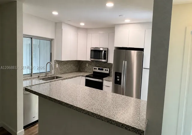 Photo 3 of Condo for sale at 16971 Sw 113th Ct #31444E, Miami, FL 33157 | MLS# A12068832 | Listing updated on 2026-09-10