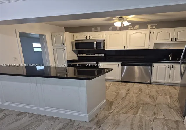 Photo 3 of Single family home for sale at 3035 Nw 68th St #12D, Fort Lauderdale, FL 33309 | MLS# A12070470 | Listing updated on 2026-09-04