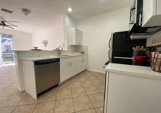 Photo 3 of Townhouse for sale at 1809 Salerno Cir, Weston, FL 33327 | MLS# A12070337 | Listing updated on 2026-09-28