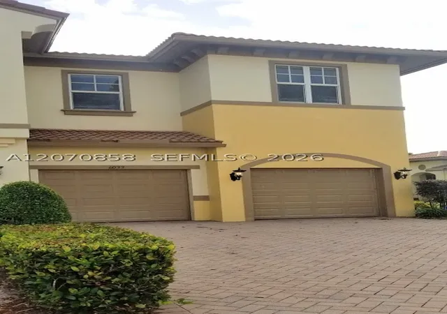 Photo 2 of Townhouse for sale at 6033 Nw 118th Dr #6033, Coral Springs, FL 33076 | MLS# A12070858 | Listing updated on 2026-08-30