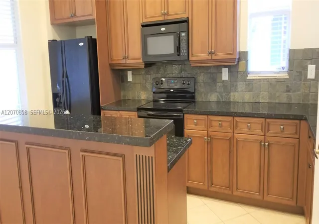 Photo 4 of Townhouse for sale at 6033 Nw 118Th Dr #6033, Coral Springs, FL 33076 | MLS# A12070858 | Listing updated on 2026-09-30