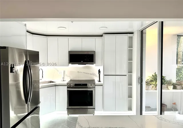 Photo 4 of Condo for sale at 671 Ne 195Th St #205E, Miami, FL 33179 | MLS# A12071207 | Listing updated on 2026-09-28