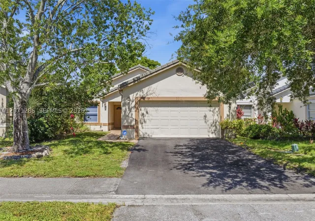 Photo 2 of Single family home for sale at 3211 Nw 123 Ave, Coral Springs, FL 33065 | MLS# A12071286 | Listing updated on 2026-09-09