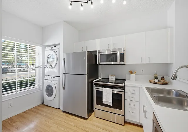Photo 2 of Townhouse for sale at 12135 Sw 3rd St, Pembroke Pines, FL 33025 | MLS# A12066189 | Listing updated on 2026-09-15