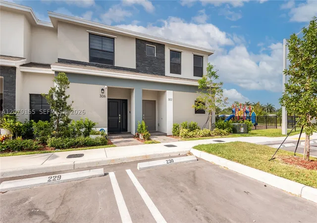 Photo 1 of Townhouse for sale at 302 Ne 1st Dr #302, Florida City, FL 33034 | MLS# A12070155 | Listing updated on 2026-09-11