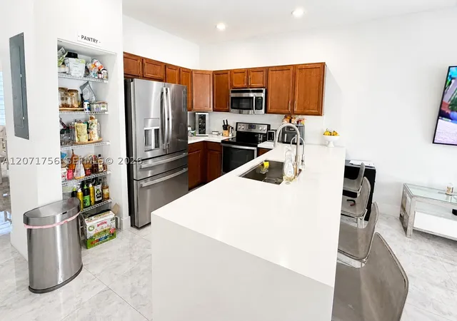 Photo 3 of Townhouse for sale at 8876 W 35Th Way, Hialeah, FL 33018 | MLS# A12071756 | Listing updated on 2026-09-02