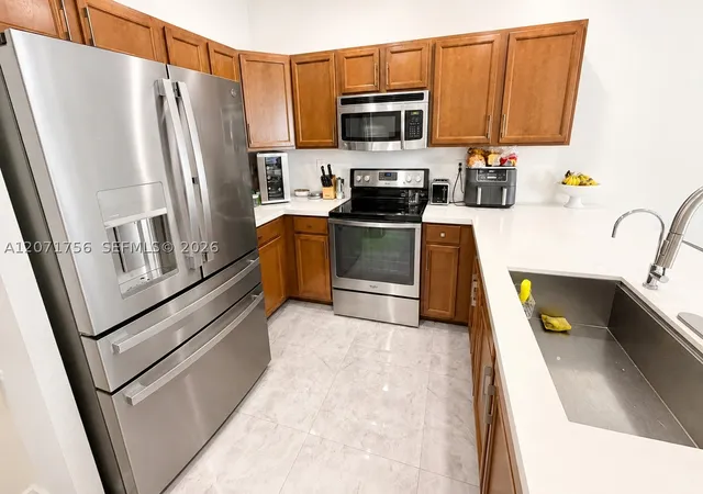 Photo 4 of Townhouse for sale at 8876 W 35Th Way, Hialeah, FL 33018 | MLS# A12071756 | Listing updated on 2026-09-02