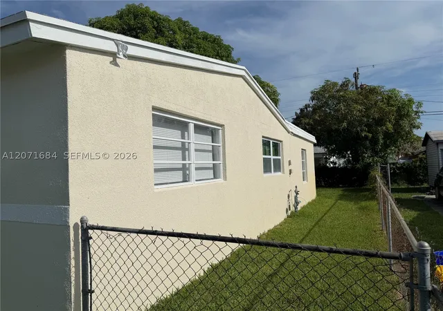 Photo 2 of Single family home for sale at 1240 W 26th Ct, Riviera Beach, FL 33404 | MLS# A12071684 | Listing updated on 2026-09-10