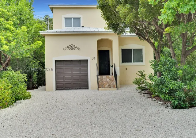 Photo 3 of Sale Pending at 30 Seagate Blvd, Key Largo, FL 33037 | MLS# A12071792 | Listing updated on 2026-09-24