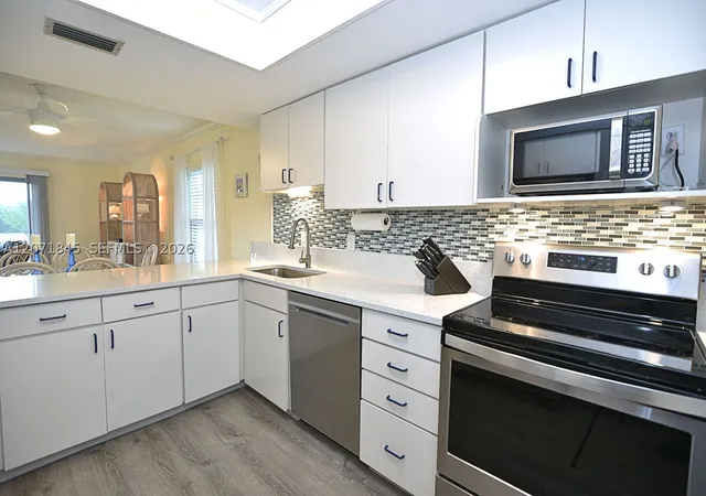 Photo 2 of Sale Pending at 18459 Se Wood Haven Ln #J, Jupiter, FL 33469 | MLS# A12071845 | Listing updated on 2026-09-17