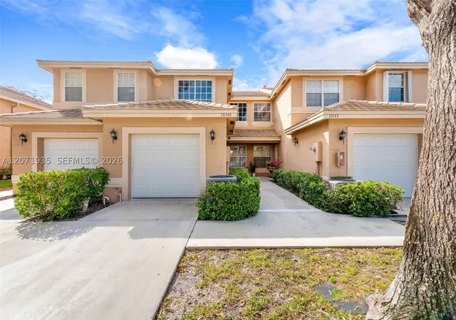 Photo 1 of Townhouse for sale at 10140 Royal Palm Blvd #402-B, Coral Springs, FL 33065 | MLS# A12071935 | Listing updated on 2026-09-14