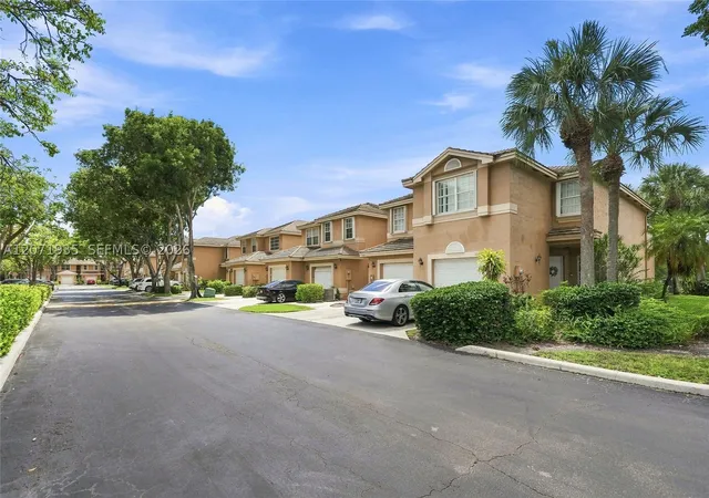 Photo 3 of Townhouse for sale at 10140 Royal Palm Blvd #402-B, Coral Springs, FL 33065 | MLS# A12071935 | Listing updated on 2026-09-14