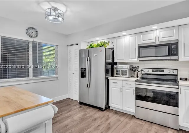 Photo 3 of Condo for sale at 12500 Sw 5th Ct #208M, Pembroke Pines, FL 33027 | MLS# A12068830 | Listing updated on 2026-08-26