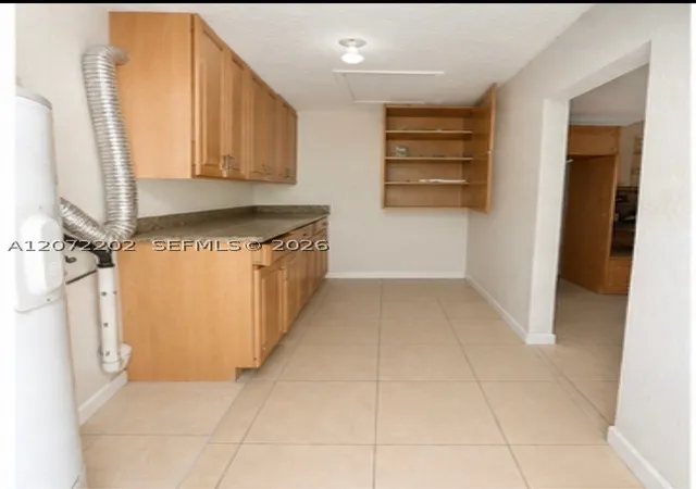 Photo 4 of Sale Pending at 2221 Nw 30Th Way, Fort Lauderdale, FL 33311 | MLS# A12072202 | Listing updated on 2026-09-08