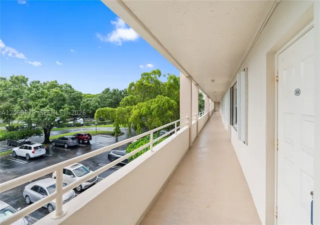 Photo 2 of Condo for sale at 3970 Oaks Clubhouse Dr #306, Pompano Beach, FL 33069 | MLS# A12069870 | Listing updated on 2026-09-08