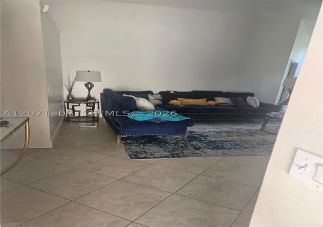Photo 2 of Single family home for sale at 818 E Palm Run Dr, North Lauderdale, FL 33068 | MLS# A12071307 | Listing updated on 2026-08-26