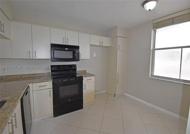 Photo 3 of Condo for sale at 10414 Nw 24th Pl #405, Sunrise, FL 33322 | MLS# A12072716 | Listing updated on 2026-09-01
