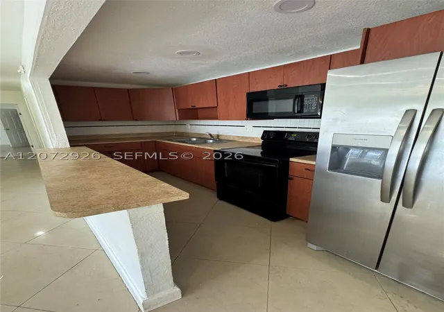 Photo 2 of Condo for sale at 4530 Nw 79th Ave #2D, Doral, FL 33166 | MLS# A12072926 | Listing updated on 2026-09-11