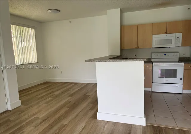Photo 3 of Condo for sale at 8010 N Nob Hill Rd #108, Tamarac, FL 33321 | MLS# A12072951 | Listing updated on 2026-09-10