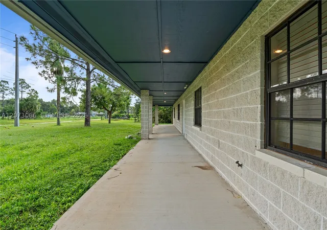 Photo 2 of Single family home for sale at 7261 N 140th Ave, West Palm Beach, FL 33412 | MLS# A12073066 | Listing updated on 2026-09-12