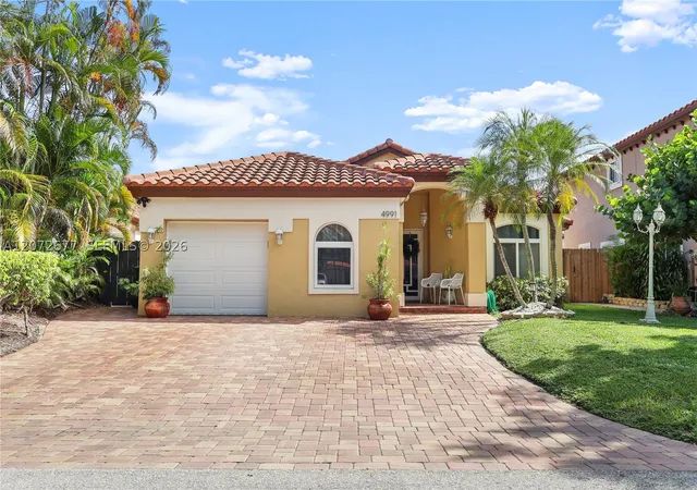 Photo 2 of Single family home for sale at 4991 Nw 54th St, Coconut Creek, FL 33073 | MLS# A12072677 | Listing updated on 2026-09-05