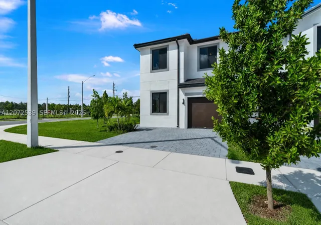 Photo 3 of Townhouse for sale at 34520 Sw 191st Ct, Homestead, FL 33034 | MLS# A12072539 | Listing updated on 2026-09-10