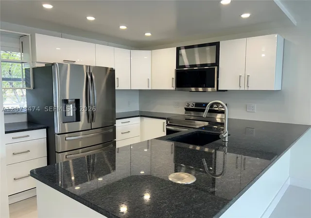 Listing Photo 4 - Condo for sale in building located at 3550 NE 169th St, North Miami Beach, FL 33160 - Unit #304