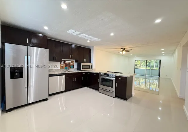 Photo 3 of Condo for sale at 6095 N Sabal Palm Blvd #103, Tamarac, FL 33319 | MLS# A12073589 | Listing updated on 2026-09-13