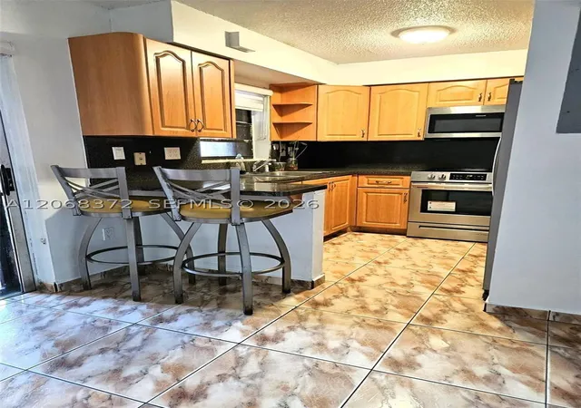 Photo 3 of Townhouse for sale at 5274 W 25Th Ln #206, Hialeah, FL 33016 | MLS# A12068372 | Listing updated on 2026-09-26