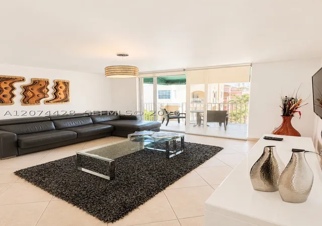 Listing Photo 1 - Condo for sale in building located at 19701 E Country Clb Dr, Miami, FL 33180 - Unit #5605