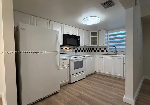 Photo 1 of Condo for sale at 30 Nw 87Th Ave #C201, Miami, FL 33172 | MLS# A12057874 | Listing updated on 2026-09-17