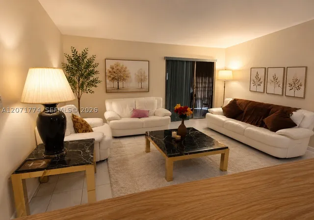 Photo 2 of Condo for sale at 9964 N Belfort Cir #201, Tamarac, FL 33321 | MLS# A12071774 | Listing updated on 2026-09-01