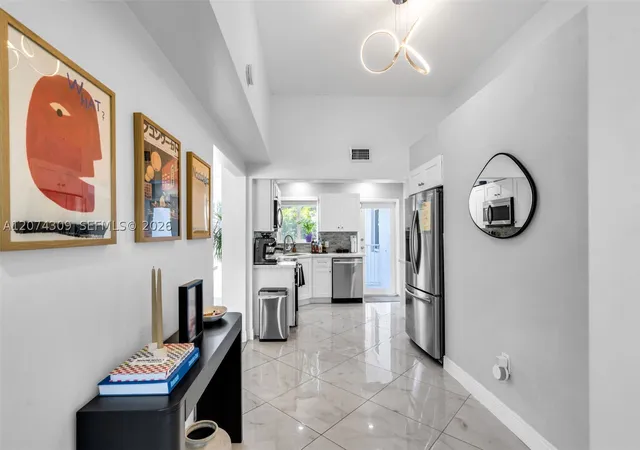 Photo 3 of Sale Pending at 8911 N Miami Ave, El Portal, FL 33150 | MLS# A12074309 | Listing updated on 2026-09-05