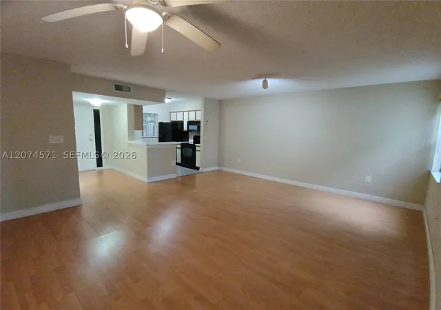 Photo 3 of Condo for sale at 2871 N Oakland Forest Dr #210, Oakland Park, FL 33309 | MLS# A12074571 | Listing updated on 2026-09-06